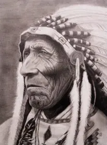 Tradition Keeper: graphite portrait of a Native American elder in traditional regalia by Michael E. Dorcas, Tantilla Art.